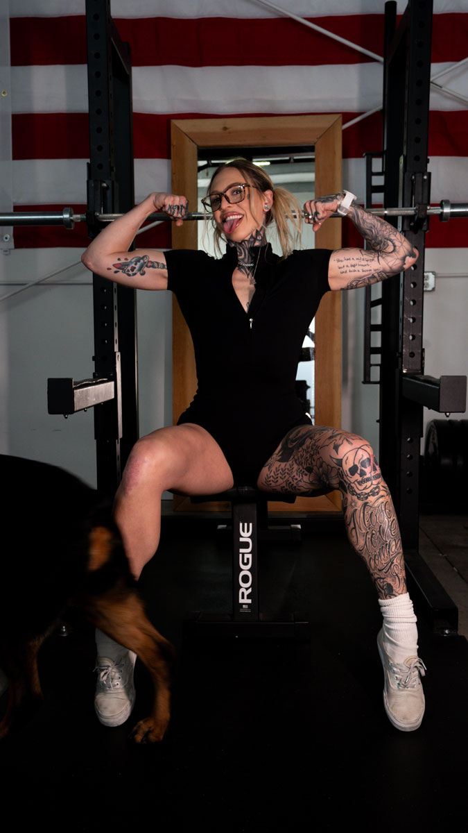 The coach is posing with her confidence.